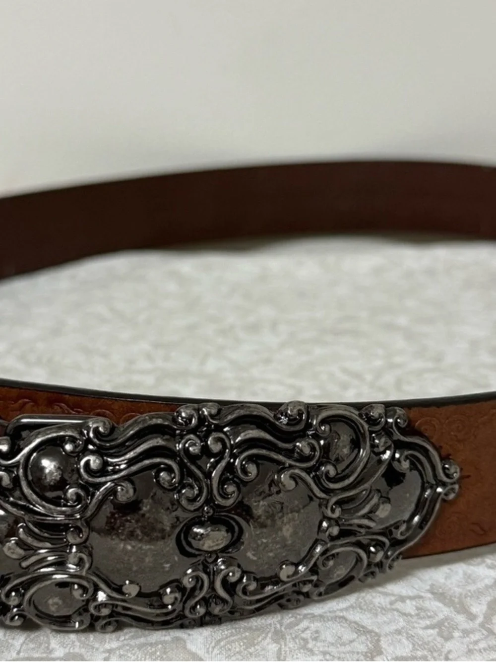 Western Tooled Brown Leather Belt with Ornate Silver Buckle